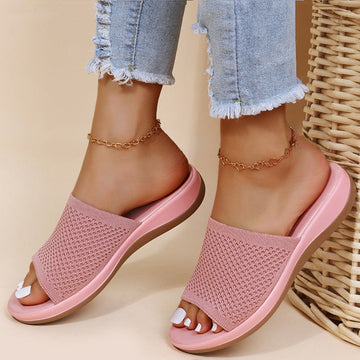Women's pink knitted mesh breathable orthopaedic summer sliders with comfort sole.